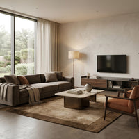 Spacious living room featuring Tappeto Indoor Teorema, accent chairs, and large windows for natural light.
